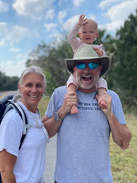Dr. Todd Dietrich with his wife and grandchild, enjoying outdoor activities and family time in Akron, OH.